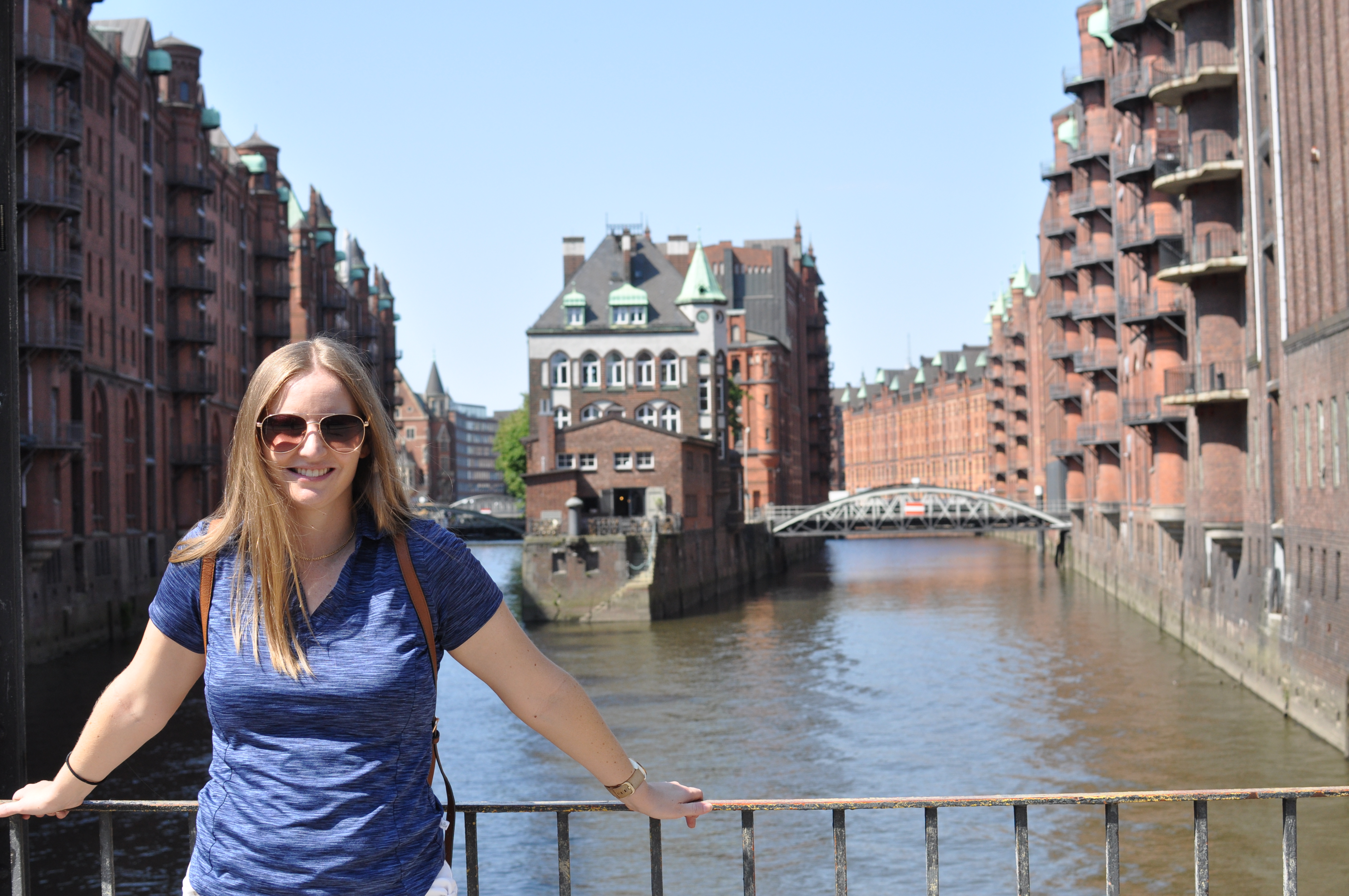 Laura Barrera standing on a bridge in Hamburg, Germany.